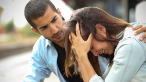 MAN COMFORTING FRIEND