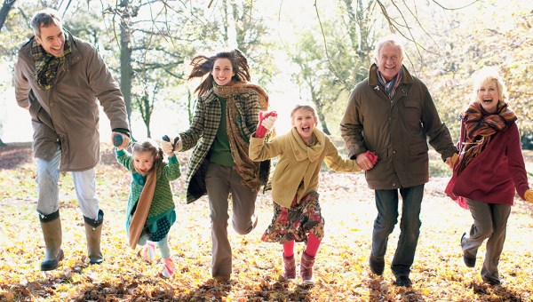 FAMILY RUNNING IN PARK