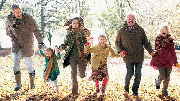 FAMILY RUNNING IN PARK