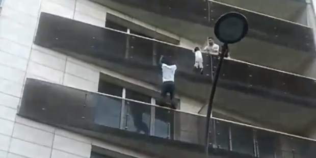 MAN,SCALES,BUILDING