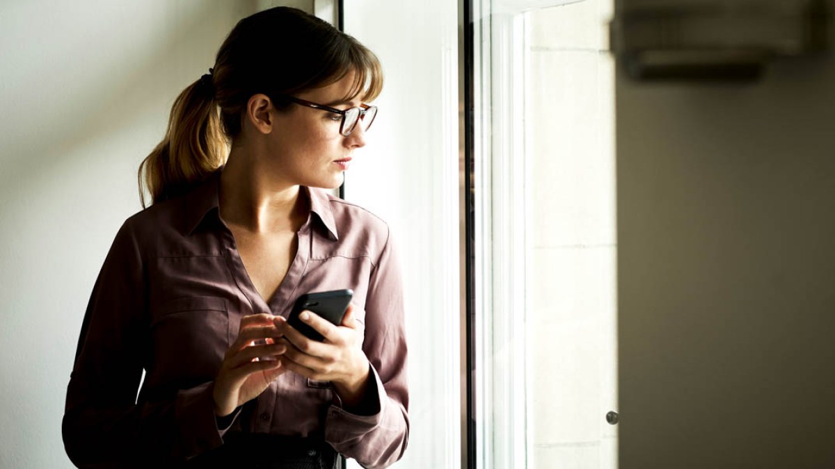 WOMAN WITH CELL PHONE