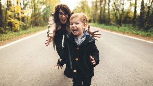 MOTHER AND CHILD PLAYING