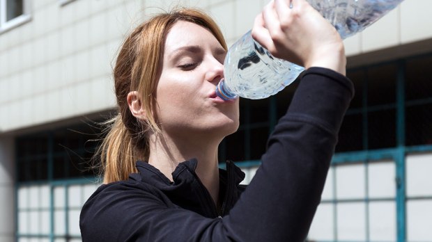 WOMAN DRINKING WATER