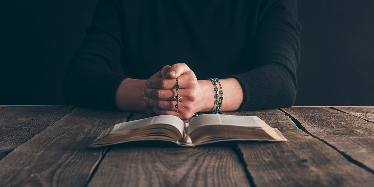 Woman Praying bible