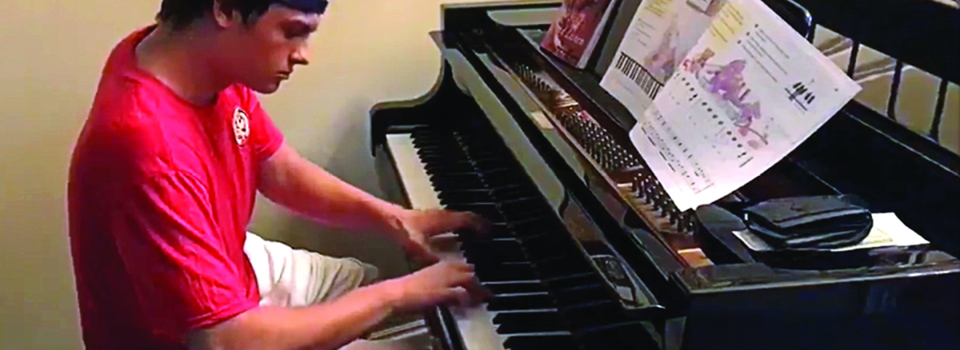 Delivery boy playing piano