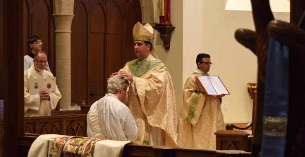 PRIEST BEING ORDAINED