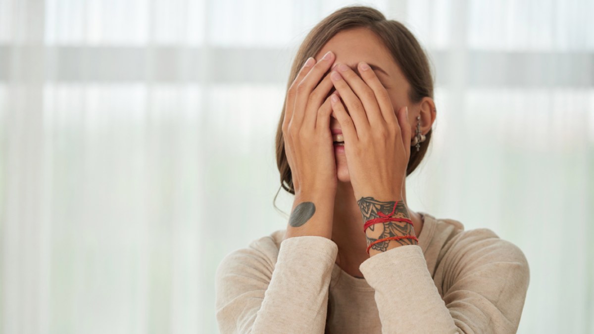 WOMAN,EMBARRASSED