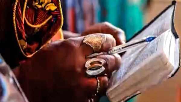 WOMAN'S HANDS,BIBLE