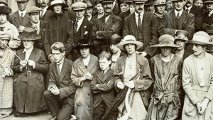 PEOPLE PRAYING ROSARY