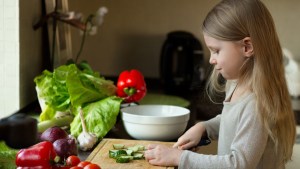 GIRL,CUTTING,VEGETABLES