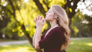 WOMAN PRAYING