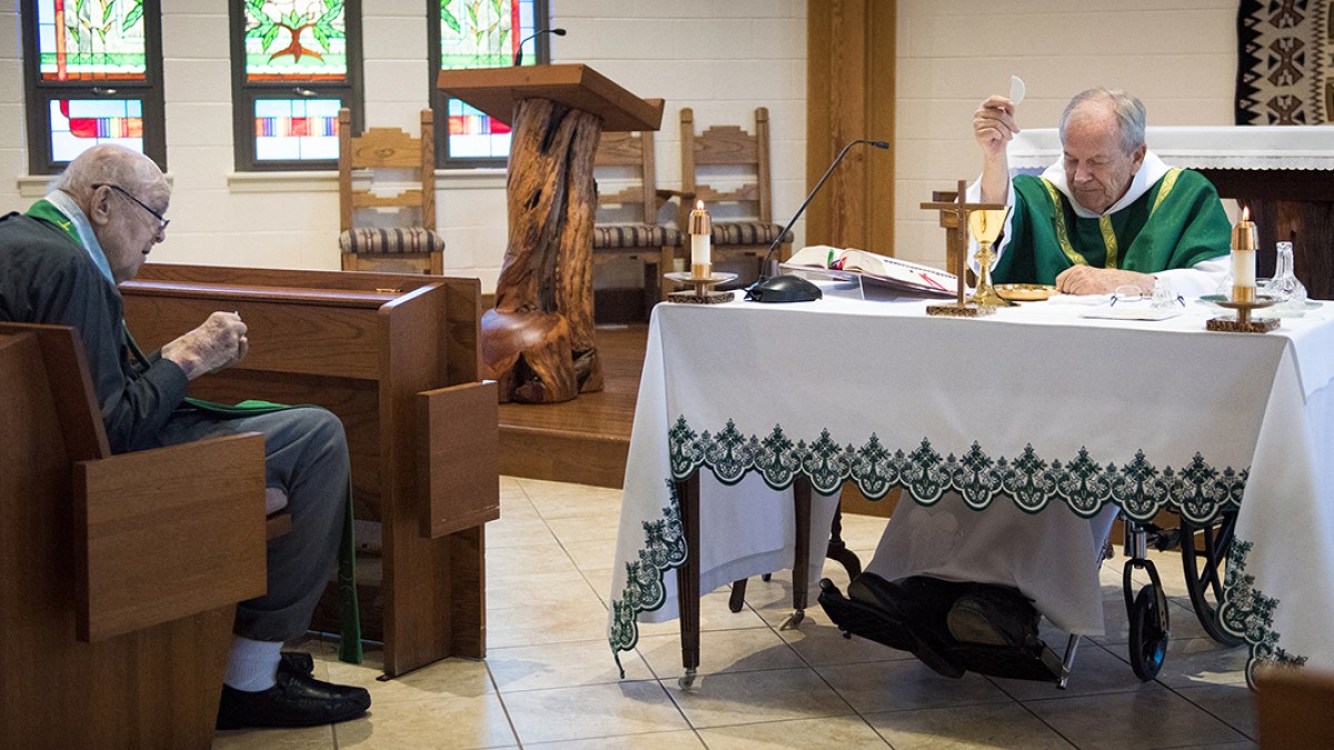 ELDERLY,PRIEST,EUCHARIST