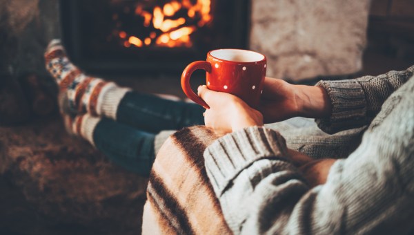 WOMAN,RELAXING,FIREPLACE