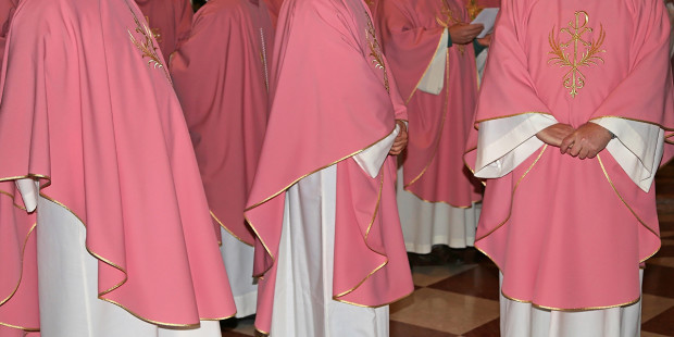 web3-priests-vestment-pink-church-shutterstock-2