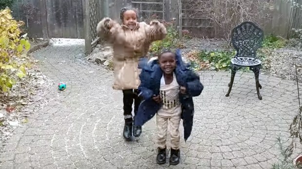 REFUGEE CHILDREN SEE SNOW