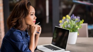 YOUNG,WOMAN,THINKING