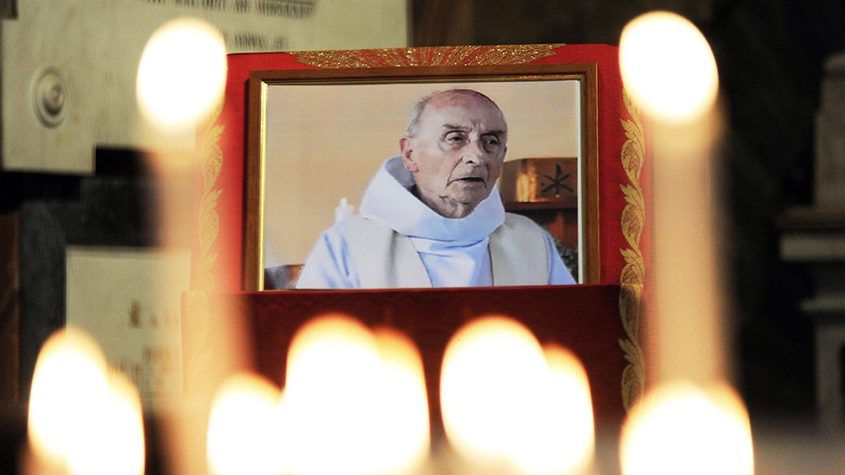 web3-father-hamel-priest-candles-afp-000_f41jt.jpg