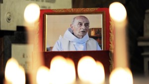 web3-father-hamel-priest-candles-afp-000_f41jt.jpg