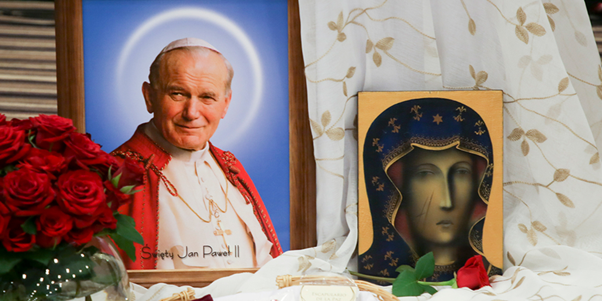 What does St. John Paul II's motto, "Totus Tuus," mean?