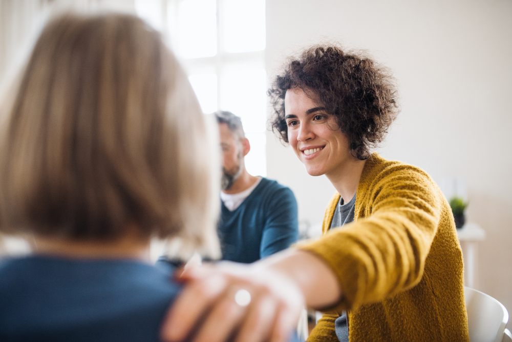 web-woman-people-talking-help-shutterstock_1316330951-halfpoint.jpg