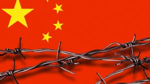 CHINA'S FLAG WITH BARBED WIRE