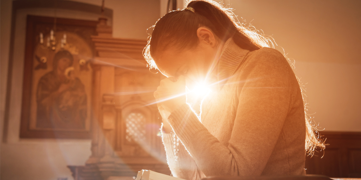 Web3-Christian-woman-praying-in-church