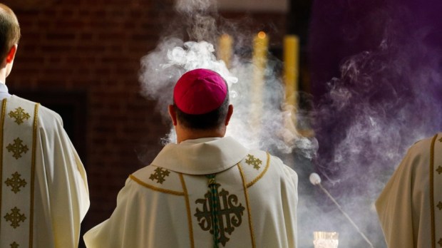 web3-bishop-celebrate-mass-behind-incense-lidia-muhamadeeva-shutterstock.jpg