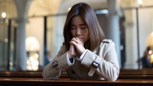web3-catholic-prayer-mass-woman-church-no-te-eksarunchai-shutterstock.jpg