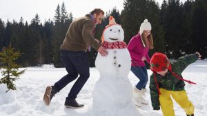 FAMILY OUTSIDE AT WINTER