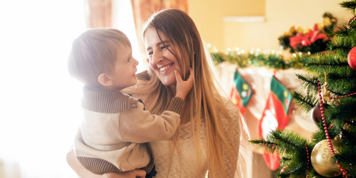 web3-portrait-of-smiling-mother-looking-at-her-little-son-in-living-room-decorated-for-christmas-shutterstock_1173116530.jpg