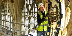 This stained glass window is larger than a tennis court