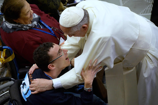 Pope Francis meets a disabled man &#8211; ar