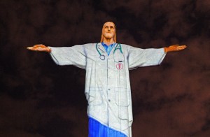 Rio’s Christ the Redeemer lit up as a doctor for Easter greetings