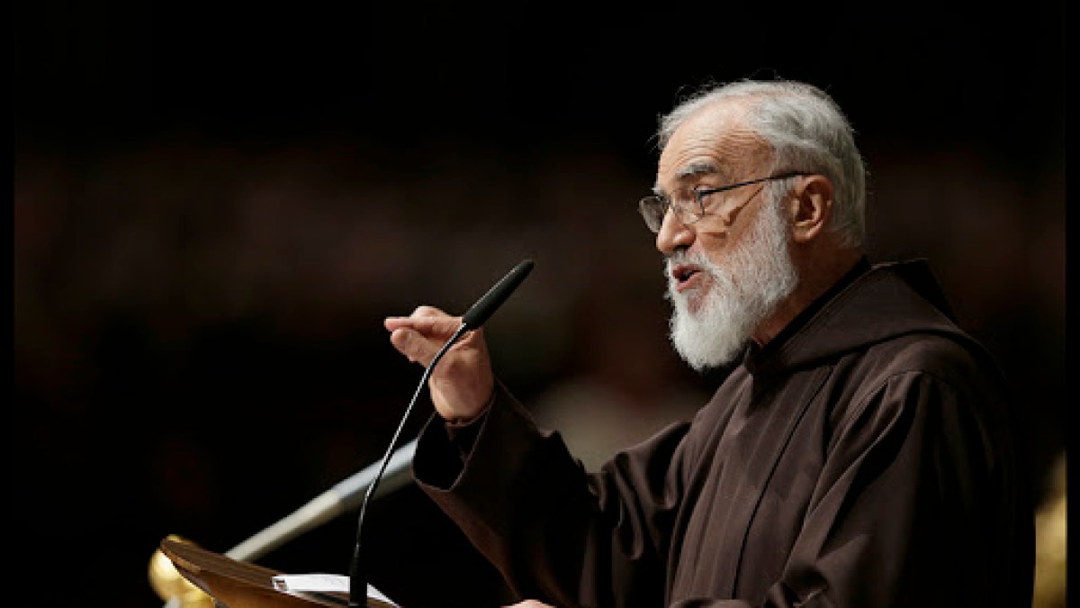 Father Raniero Cantalamessa speaks during the Passion of Christ Mass inside St. Peter’s Basilica, at the Vatican.