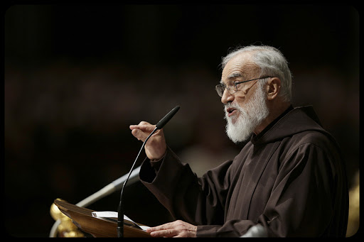 Father Raniero Cantalamessa speaks during the Passion of Christ Mass inside St. Peter&#8217;s Basilica, at the Vatican.