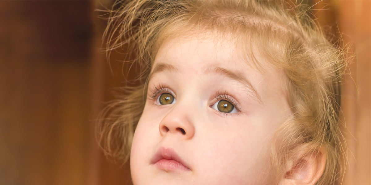 WEB3-Little-girl-gazing-thoughtfully-into-the-distance-Shutterstock_178815407.jpg