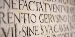 Why is Latin the official language of the Church, instead of Aramaic or Hebrew?