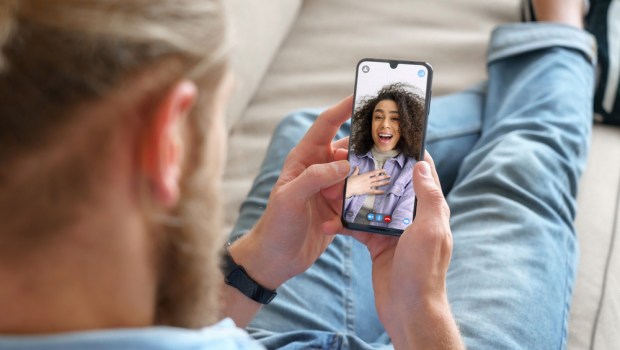 Young man; girlfriend; video call