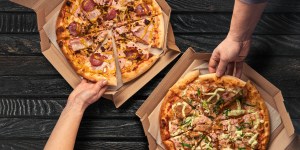 Benefactor pays $10,000 for 2 pizzas