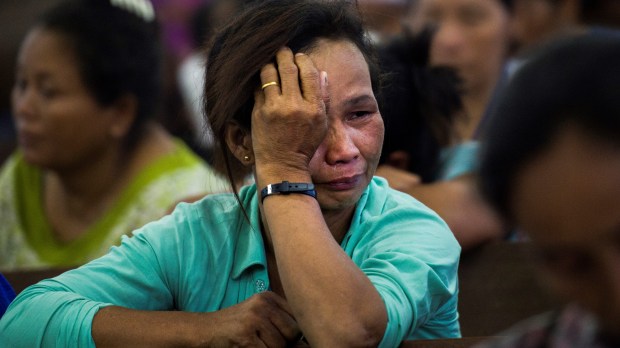 WEB2-PRAY-CRY-WOMAN-MYANMAR-AFP-000_14R2AN.jpg