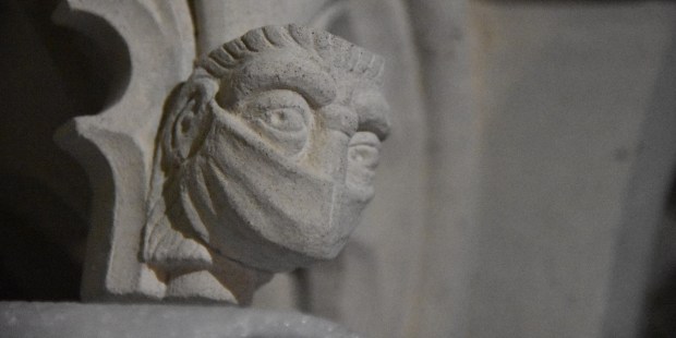 MASKED FIGURE AT THE SHRINE OF ST. AMPHIBALUS