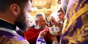 Why do some Eastern Catholics use spoons for Holy Communion?