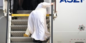 Pope trips on plane stairs as he departs Athens