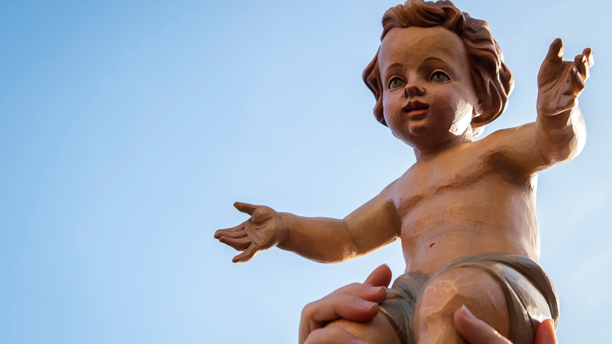 BABY JESUS, SKY, HAND
