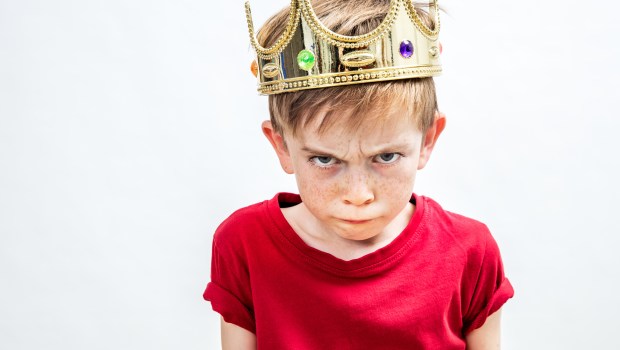 Angry boy with crown