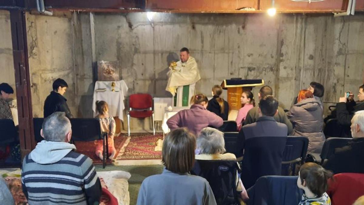 Ukraine Night adoration in the shelter of St. Anthony Parish in Kyiv.