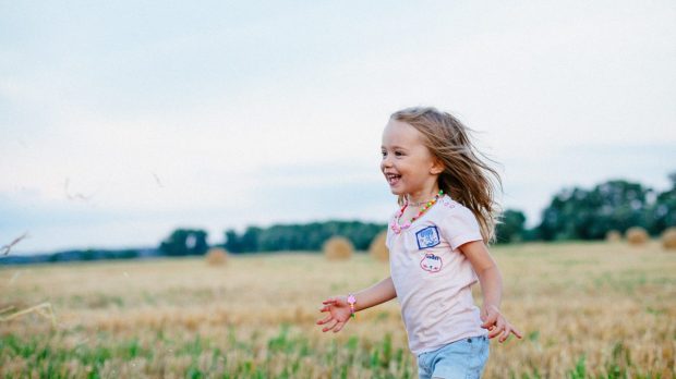 child, girl, field, happy, laugh, outside, carefree
