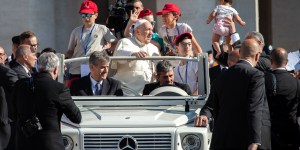 Pope gives kids a ride in the popemobile
