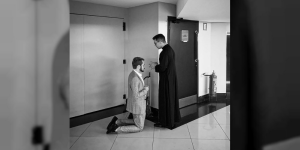 Priest hears confession at the movie theater