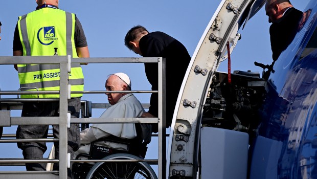 Pope-Francis-boards-his-plane-at-Romes-Fiumicino-airport-as-he-departs-for-a-trip-to-Canada-AFP-
